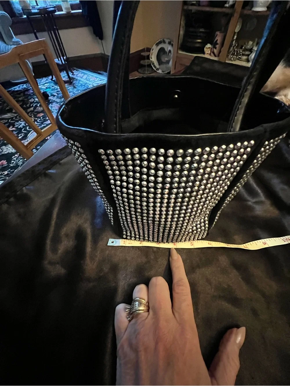 Fun and funky black and silver studded bucket bag. 80s and 90s studio 51 vibes!